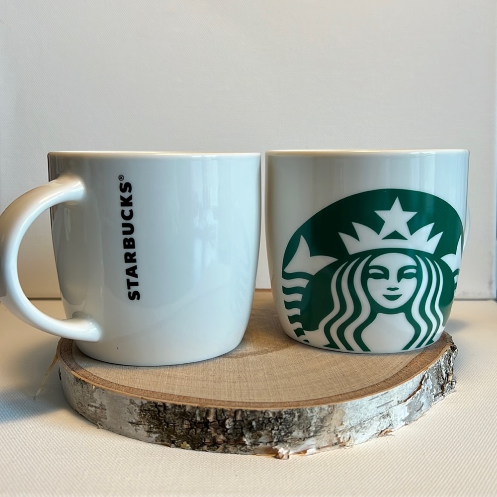 Pair of Starbucks round coffee mugs. Large Starbucks siren logo!